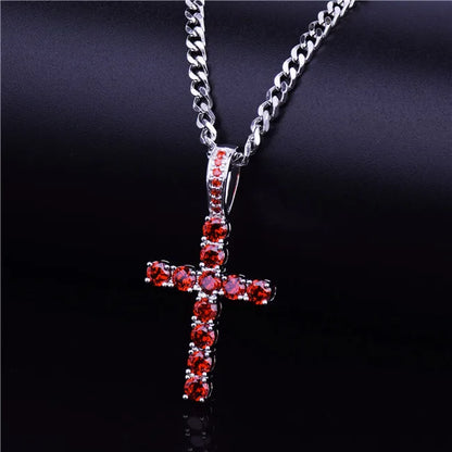 Shiny hip hop cross necklace with red gemstones on a silver chain for a stylish look