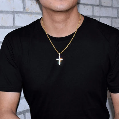 Stylish hip hop cross necklace with a shimmering pendant worn by a man in a black t-shirt