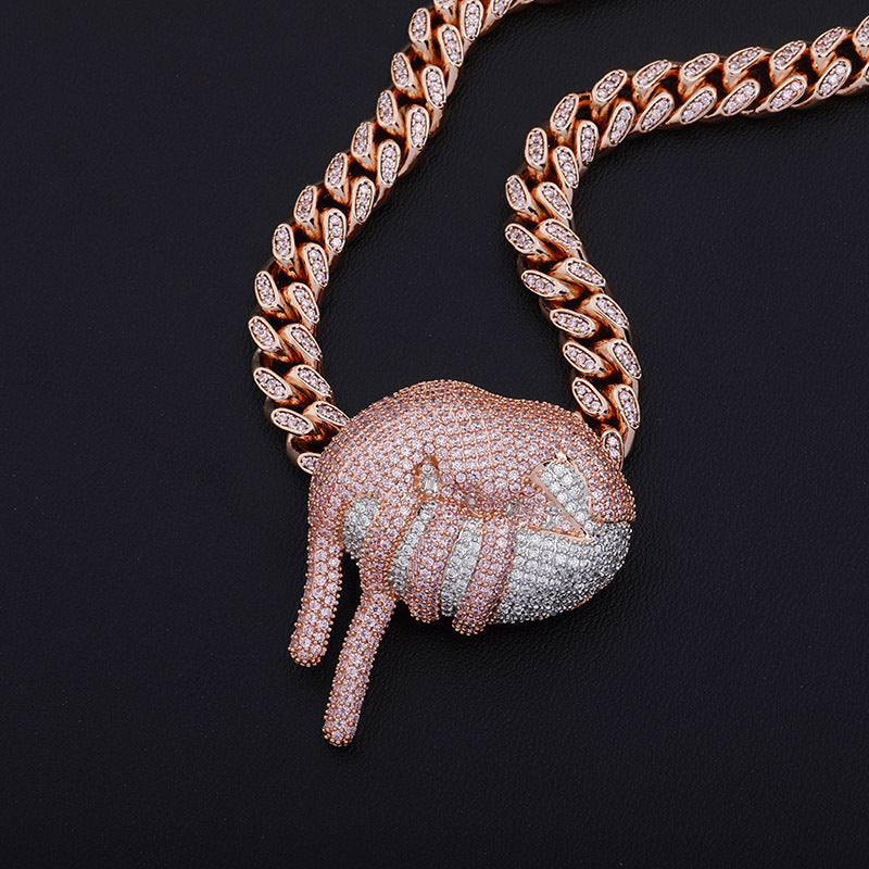 DatNewDrip rose gold Cuban link necklace featuring iced out lips pendant encrusted with white and rose cubic zirconia