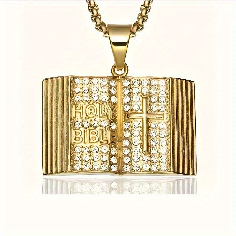 Gold iced out bible pendant with sparkling rhinestones and a cross design, on a chain necklace