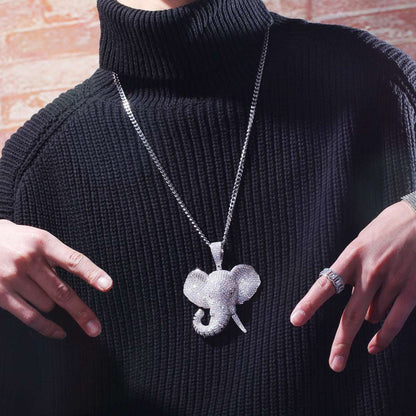 iced out elephant pendant necklace worn over black sweater with silver chain jewelry style