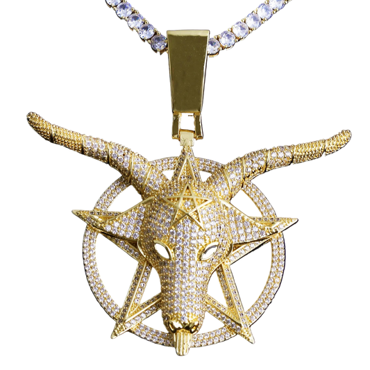 Iced out goat pendant necklace in gold with intricate detailing and a sparkling chain