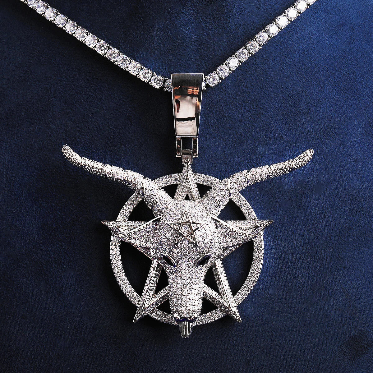 Iced out goat pendant necklace with detailed design and sparkling diamonds on a silver chain