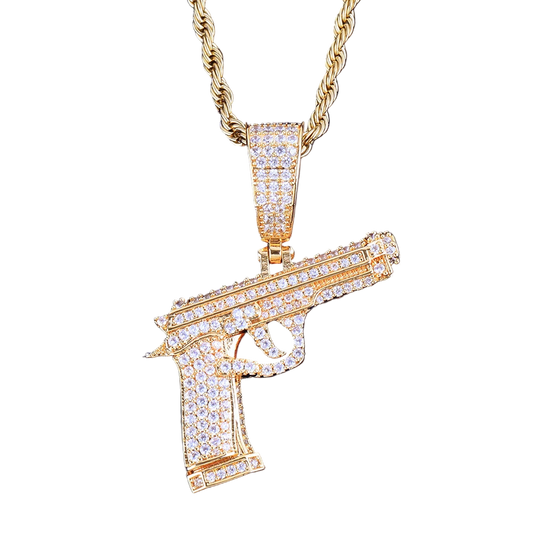 Iced out gun necklace in gold with sparkling rhinestones on a twisted chain