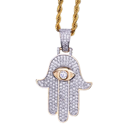Iced out hamsa hand pendant necklace with gold-toned chain and sparkling diamond accents