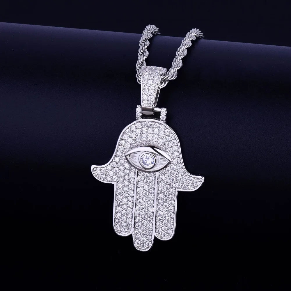 DATNEWDRIP iced out hamsa hand pendant necklace with dazzling diamond details and eye design