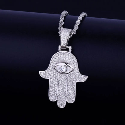 DATNEWDRIP iced out hamsa hand pendant necklace with dazzling diamond details and eye design