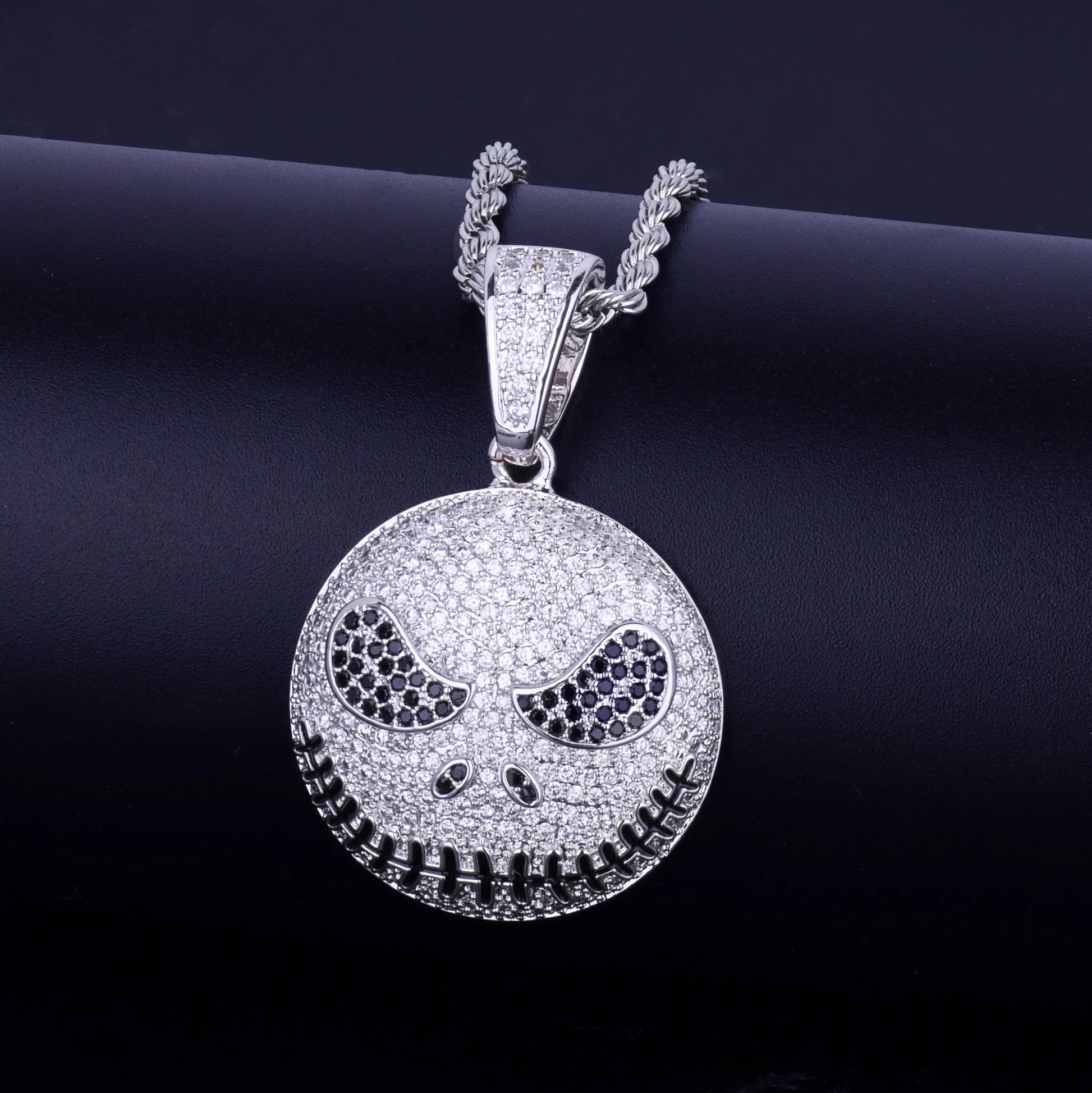 Iced out jack skeleton smiling pendant necklace with sparkling rhinestones and a bold design