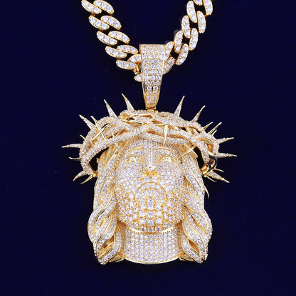 Iced out Jesus piece necklace in gold with intricate detailing and sparkling accents
