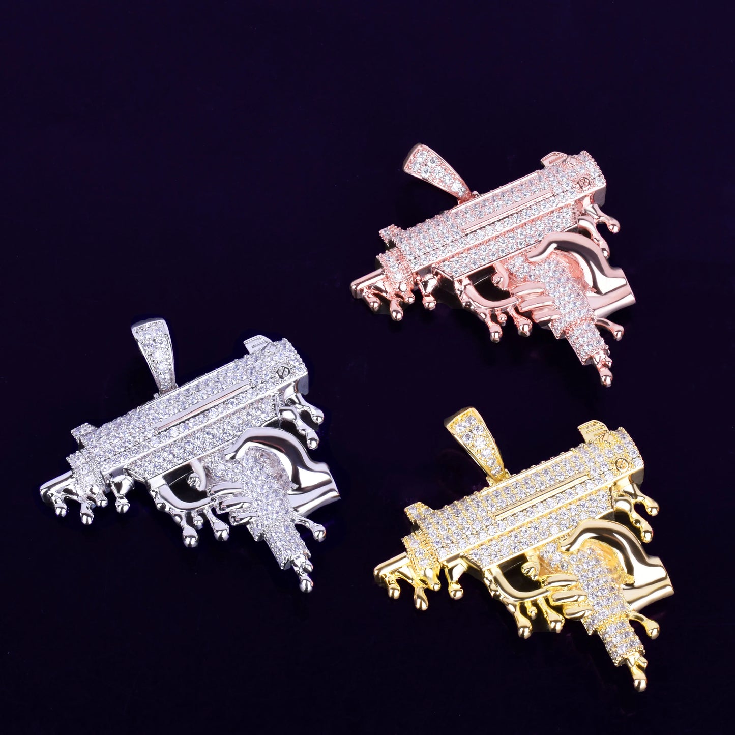 Iced Out Opps Uzi Pendant Necklace available in gold, silver, and rose gold with sparkling design