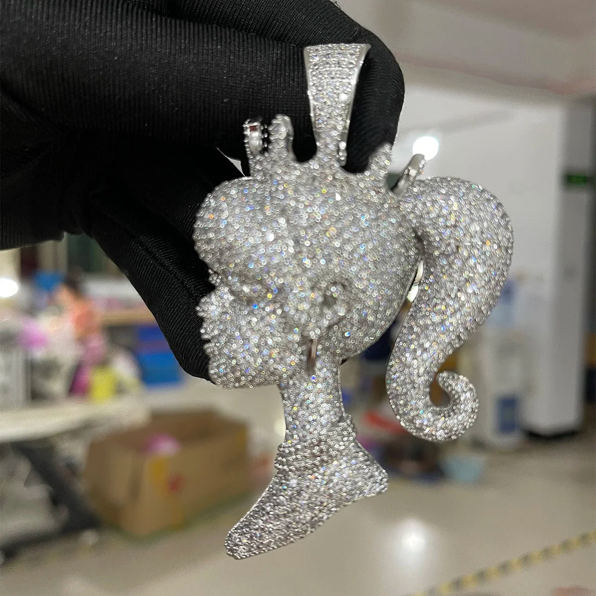 Iced Out queen doll rapper pendant jewelry featuring a sparkling design and intricate details
