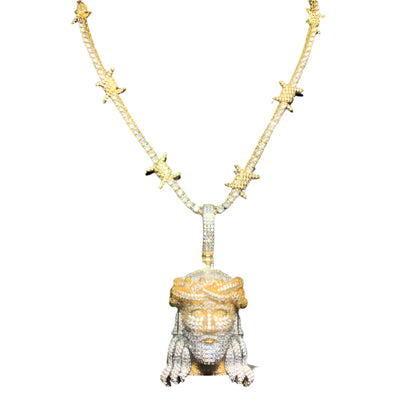 DatNewDrip iced out Jesus pendant two tone gold and silver diamond encrusted Jesus head on star link chain