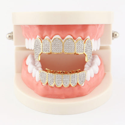 DatNewDrip iced out vampire fang grillz gold diamond pave upper and lower displayed on dental model
