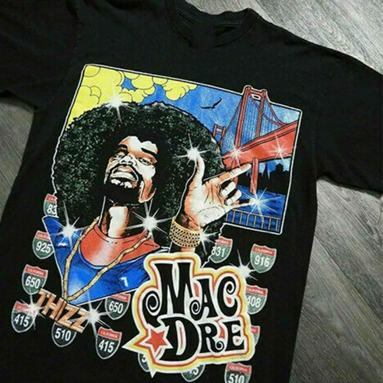 Black Mac Dre graphic tee featuring vibrant colors and a detailed retro design with iconic San Francisco imagery.