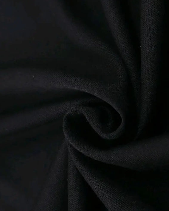 Close-up of soft black fabric showcasing the texture of the Walt Whiskey t-shirt mens