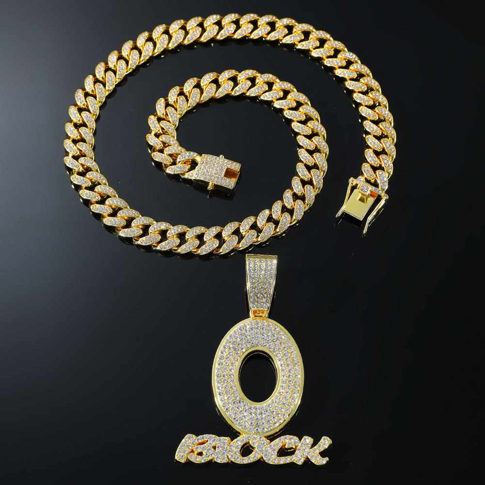 DatNewDrip gold chain with sparkling O Block jewelry pendant featuring diamond accents