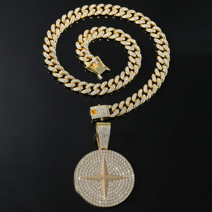 DatNewDrip gold Cuban link chain with iced out compass pendant round diamond encrusted compass star medallion