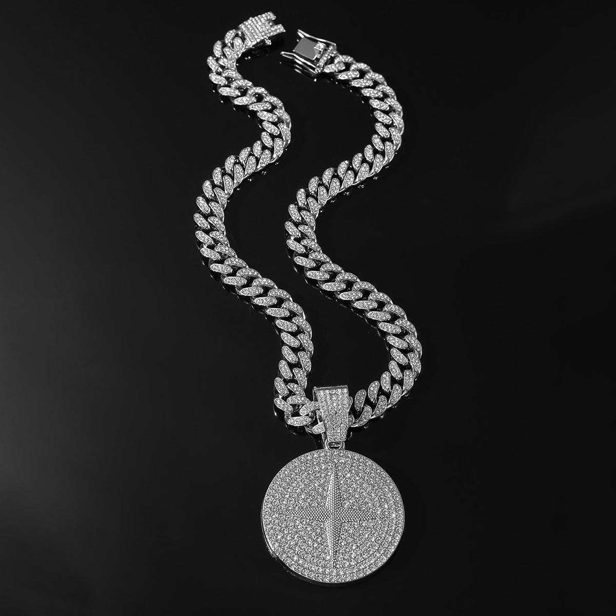 DatNewDrip iced out compass pendant on diamond encrusted Cuban link chain for bold style