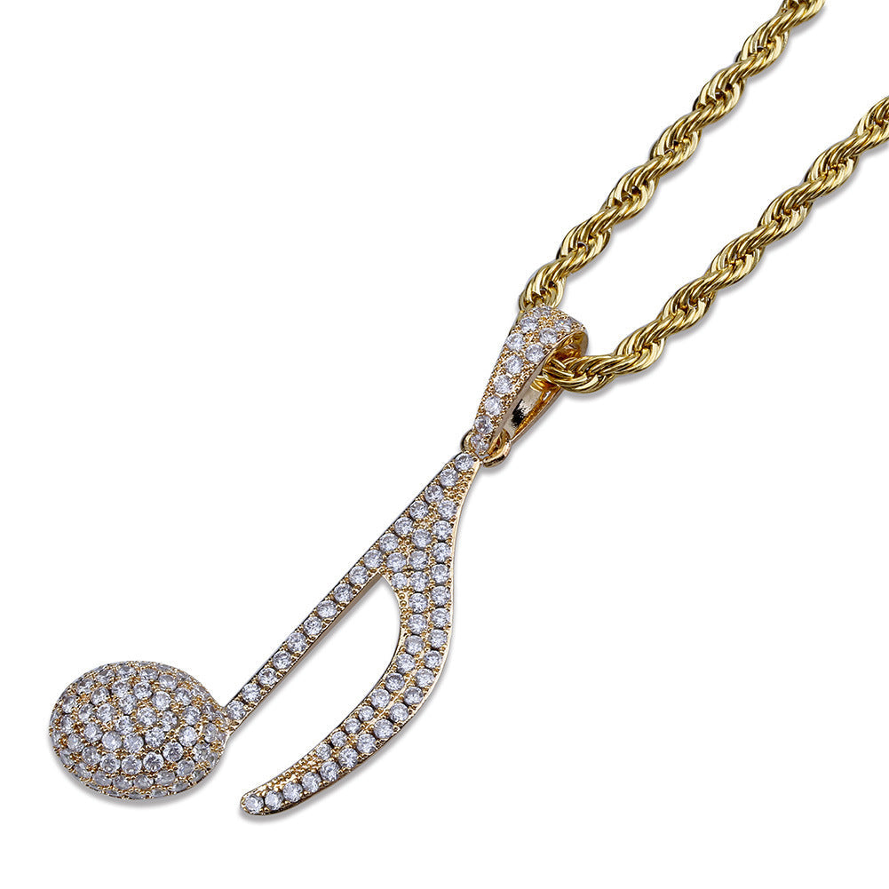 DatNewDrip gold rope chain necklace with iced out music note pendant encrusted with white stones