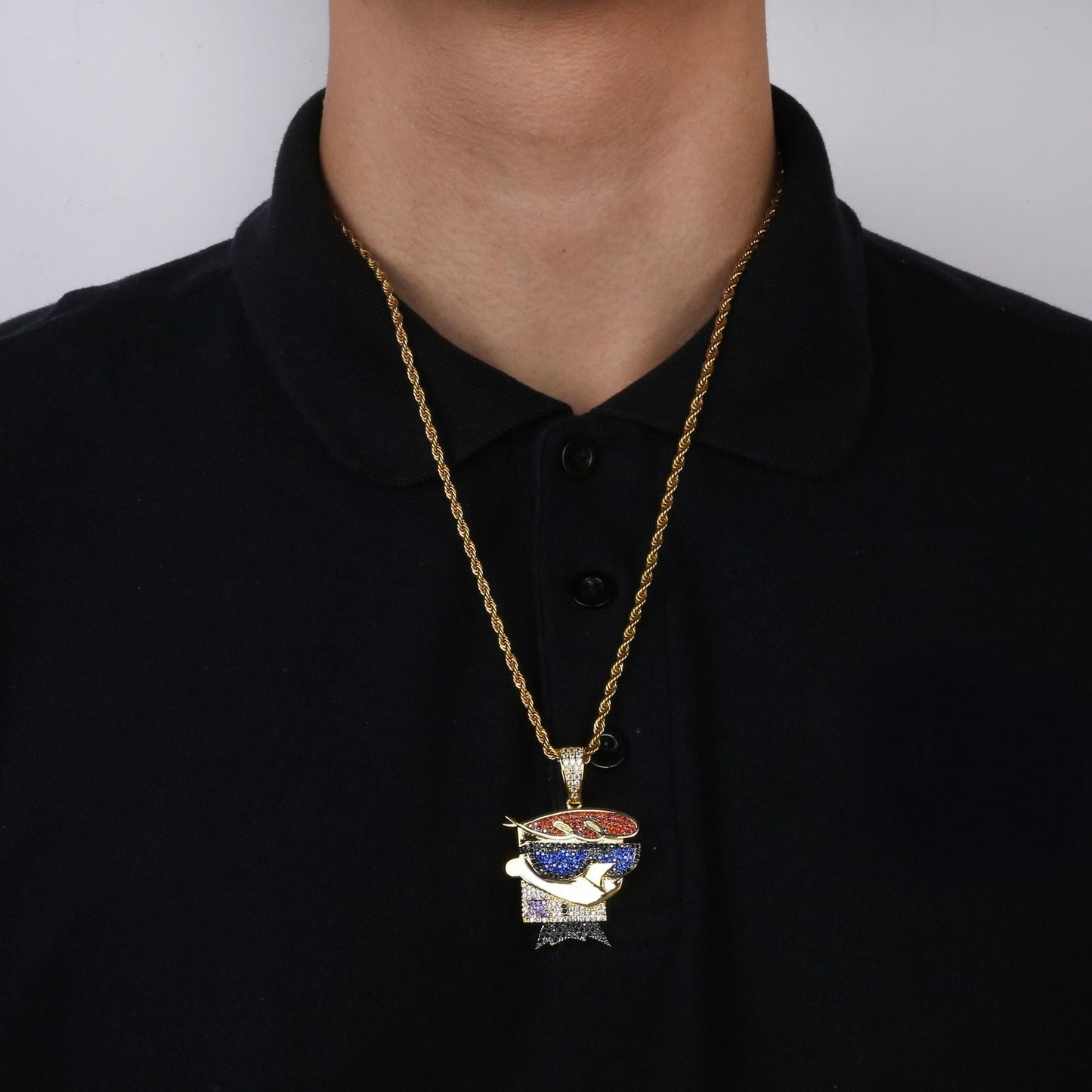 Dexters Laboratory iced out pendant on gold rope chain by DatNewDrip with blue red enamel and clear stones
