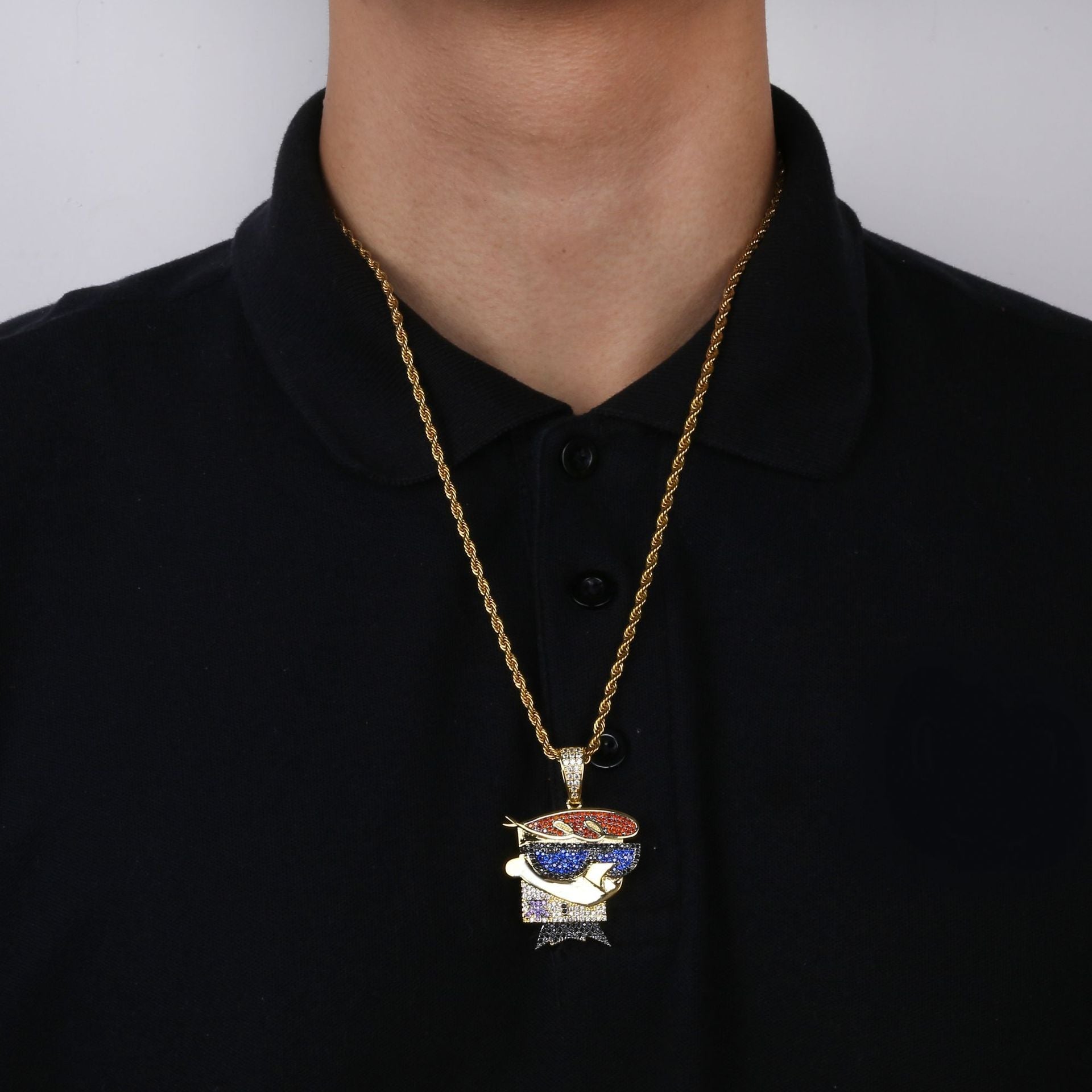 Dexters Laboratory iced out pendant on gold rope chain by DatNewDrip with blue red enamel and clear stones