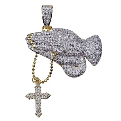 DatNewDrip iced out praying hands pendant in gold and silver with pave stones and dangling cross