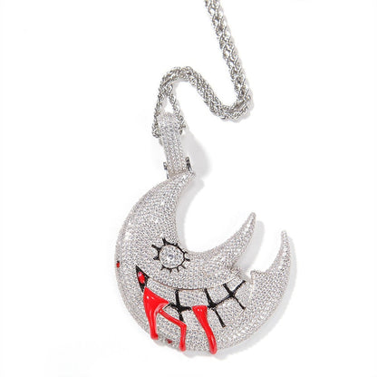 DatNewDrip iced out trippie red moon pendant silver crescent with pave stones black stitched smile and red drip accents