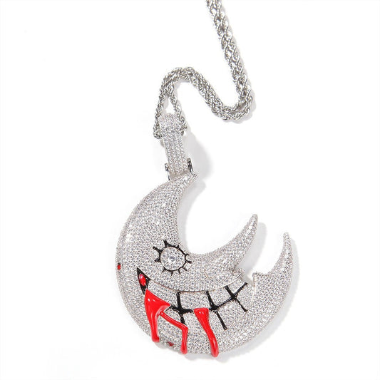 DatNewDrip iced out trippie red moon pendant silver crescent with pave stones black stitched smile and red drip accents