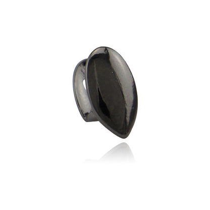 DatNewDrip black single tooth fang grillz for teeth shiny metal vampire style cap on white background