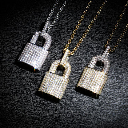 DatNewDrip iced out lock pendant trio in sterling silver and gold tones with pave crystals on rope chains
