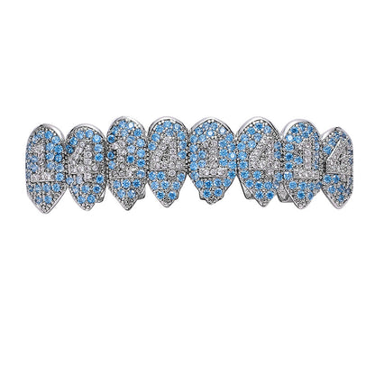 DatNewDrip iced out monster fang grillz in silver with blue and clear cubic zirconia stones full upper set