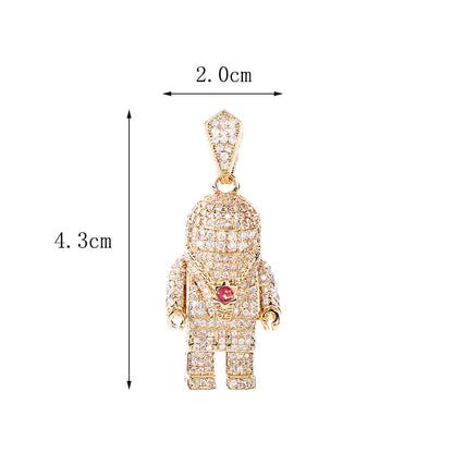 DatNewDrip iced out spaceman pendant gold astronaut jewelry encrusted with clear crystals and red chest gem 4.3 cm by 2.0 cm