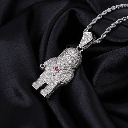 DatNewDrip iced out spaceman pendant in silver encrusted with CZ on rope chain with red gem chest accent