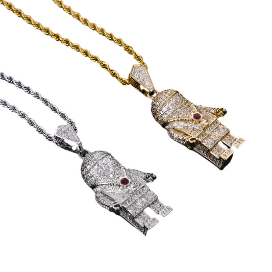 DatNewDrip iced out spaceman pendant duo in gold and silver tones with pave crystals and red gem eye on rope chains