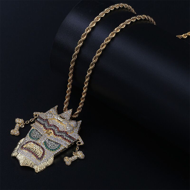 DatNewDrip gold rope chain with Iced Out Crash Bandicoot pendant encrusted with multicolor stones and bone charms