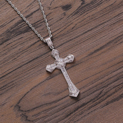 DatNewDrip iced out cross pendant on silver rope chain sparkling cubic zirconia cross on wooden background